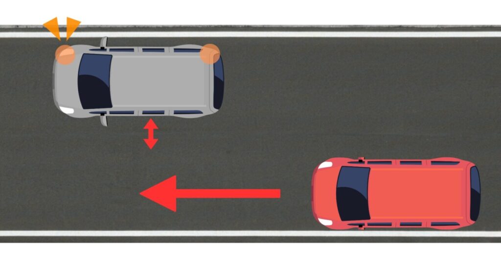 停止車を避けるための車線変更を示したイラスト図